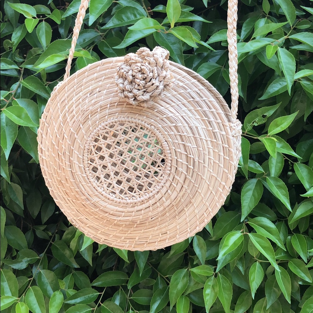 Woven circle cross body bag